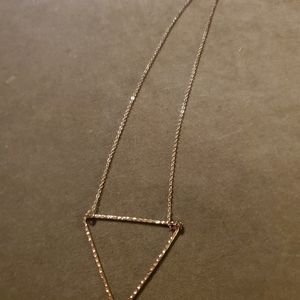 Gold necklace with triangle